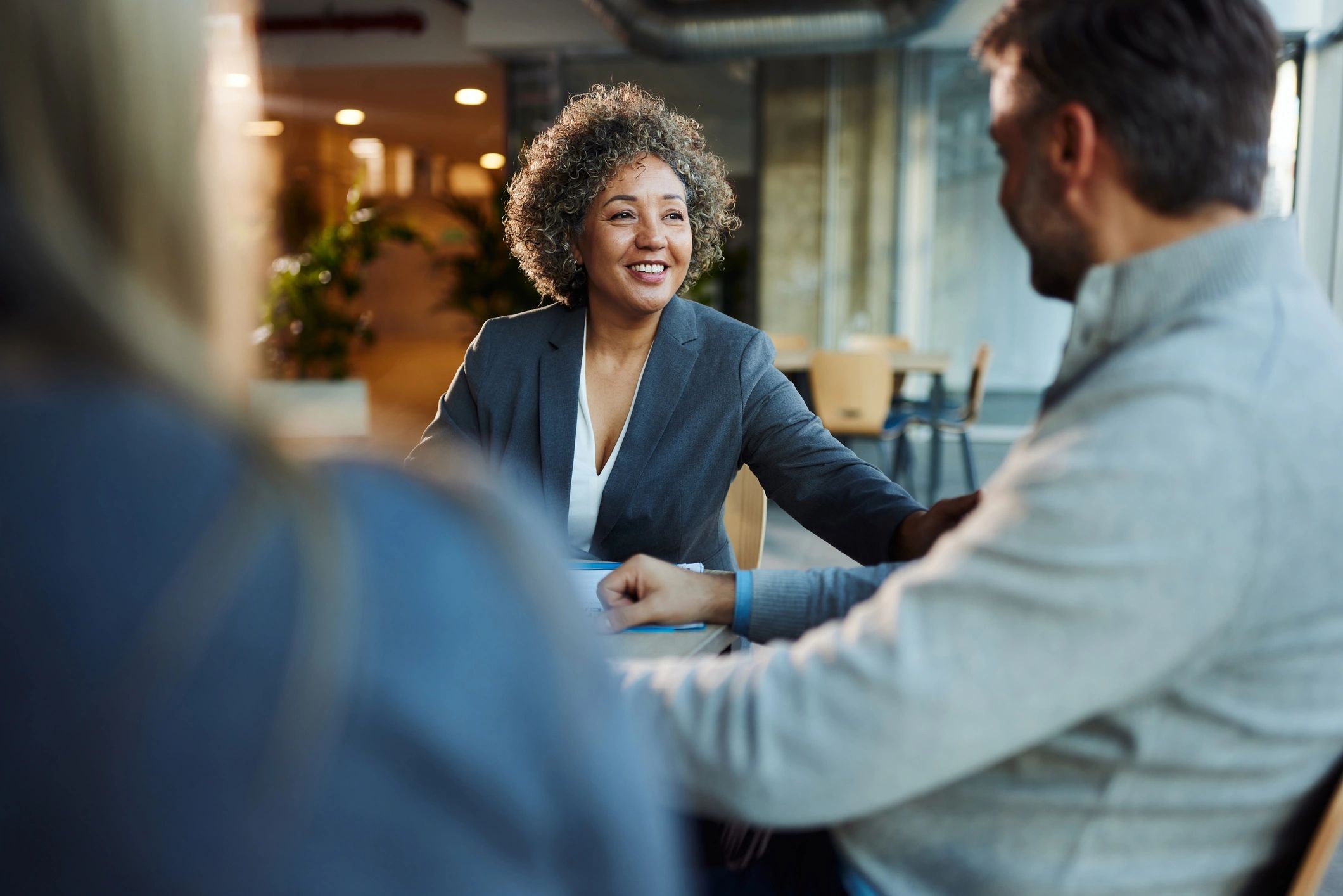 Client services representative in a professional meeting