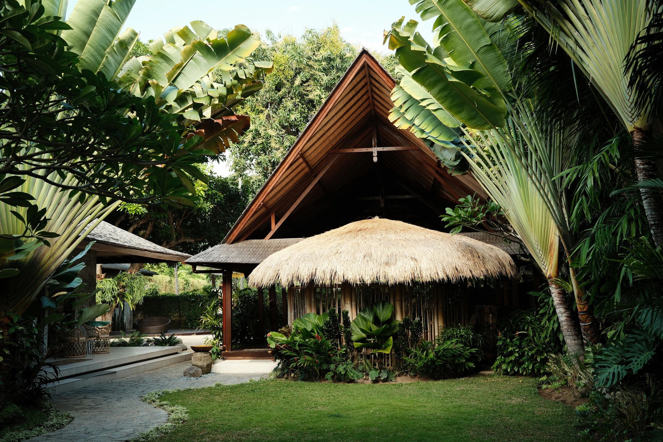Tropical villa surrounded by lush garden